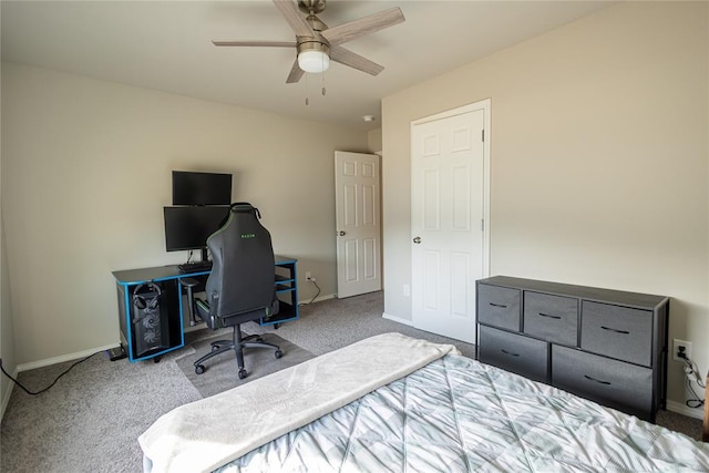 bedroom featuring ceiling fan and light carpet