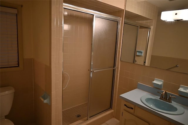 bathroom with tile walls, an enclosed shower, decorative backsplash, and toilet