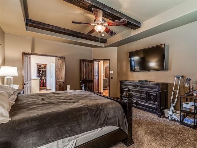 bedroom featuring ceiling fan, a raised ceiling, beamed ceiling, and carpet