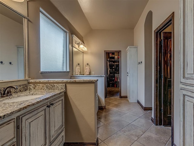 bathroom with vanity and tile patterned floors