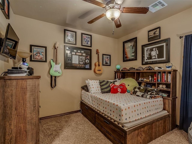 bedroom featuring ceiling fan and light colored carpet