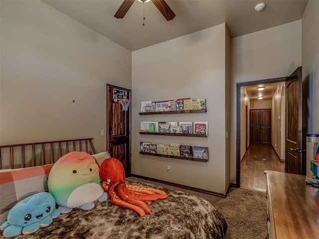 carpeted bedroom with ceiling fan