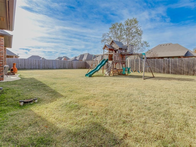 view of jungle gym with a yard