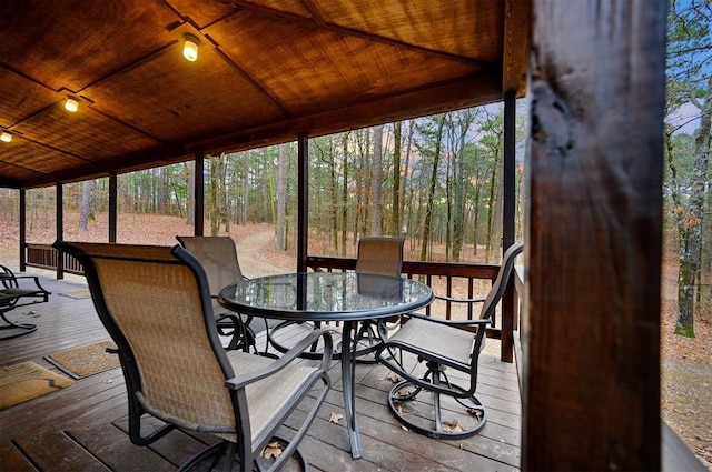 sunroom / solarium featuring wood ceiling