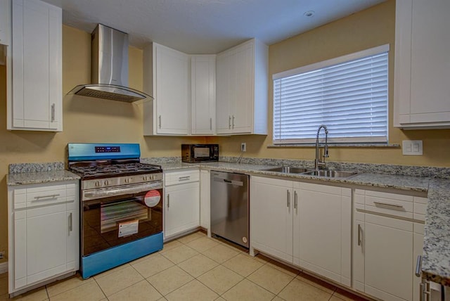 kitchen featuring white cabinetry, appliances with stainless steel finishes, sink, and wall chimney range hood