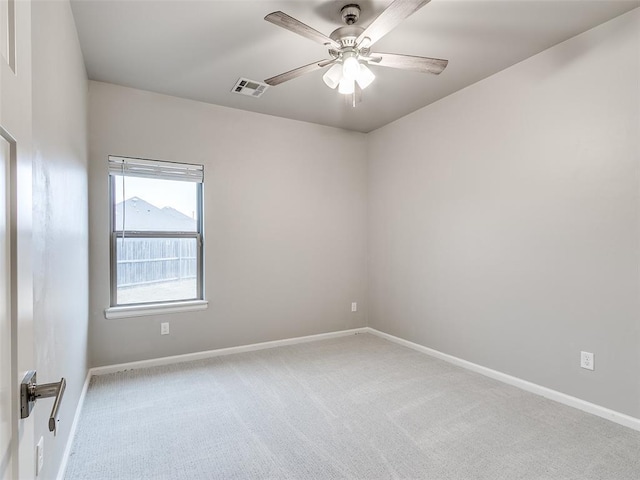 carpeted empty room with ceiling fan