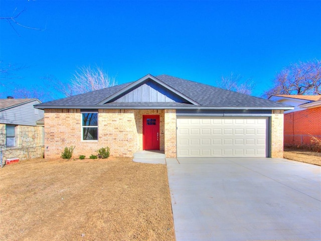 single story home featuring a garage