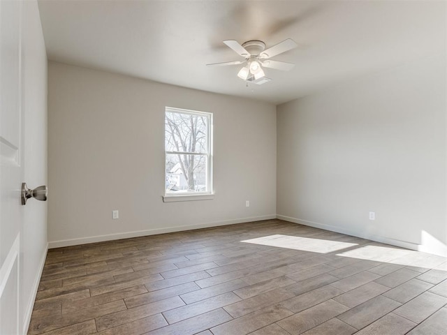 unfurnished room featuring ceiling fan and light hardwood / wood-style floors