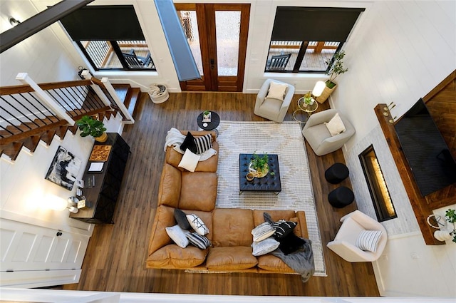 living room with hardwood / wood-style floors and french doors