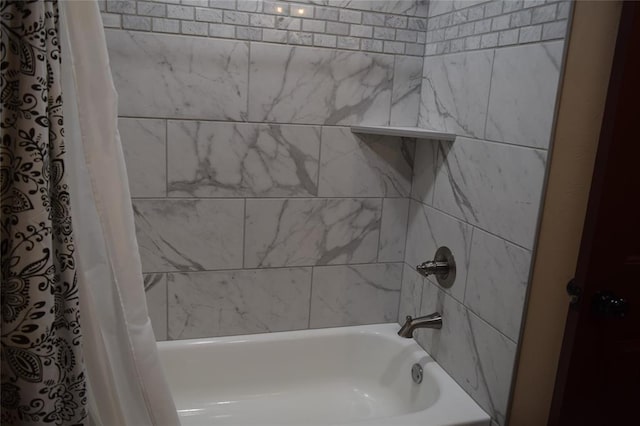 bathroom featuring shower / tub combo with curtain