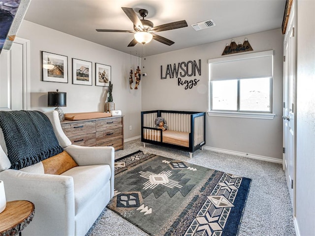 carpeted bedroom featuring ceiling fan