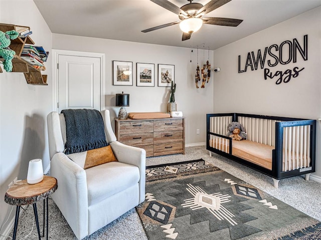 carpeted bedroom featuring ceiling fan