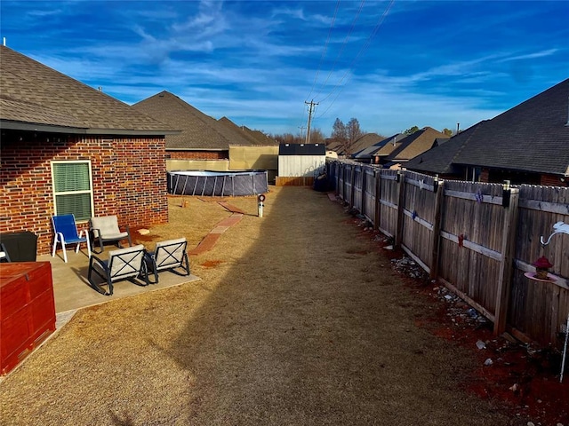 view of yard featuring a patio