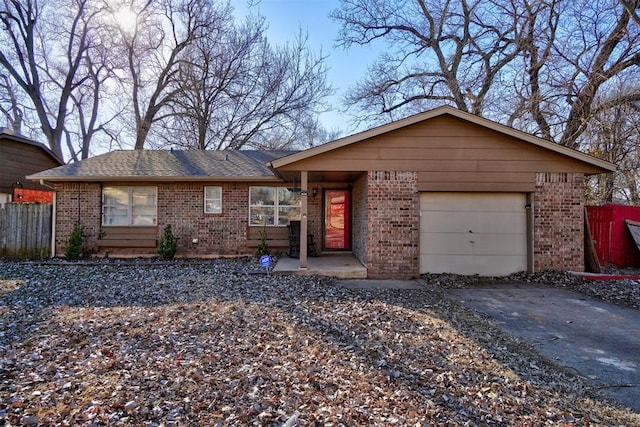 ranch-style home with a garage