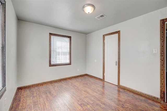 unfurnished bedroom featuring wood-type flooring