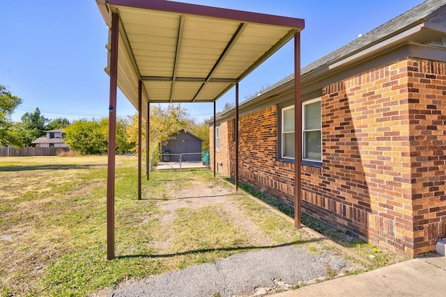 view of side of property with a yard