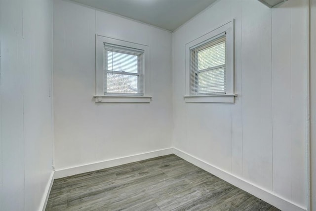 empty room with wood-type flooring