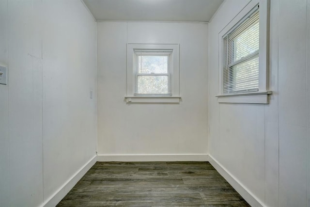 spare room featuring dark hardwood / wood-style flooring