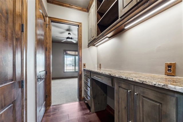 bathroom featuring crown molding, wood-type flooring, and ceiling fan