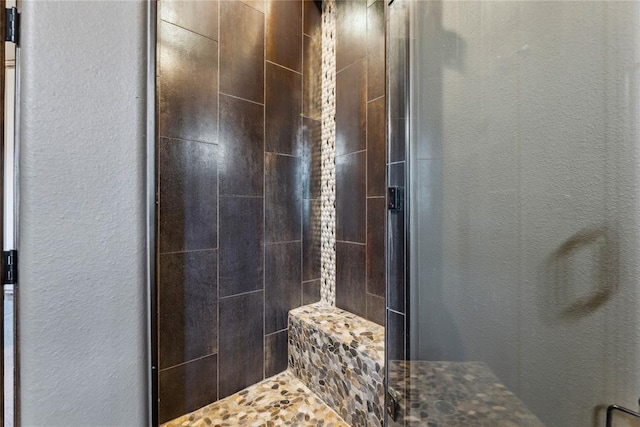 bathroom featuring an enclosed shower