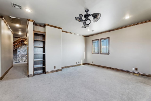 unfurnished bedroom featuring crown molding and light carpet