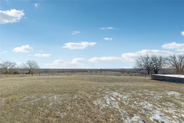 view of yard with a rural view