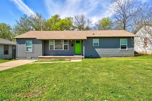 ranch-style house featuring a front yard