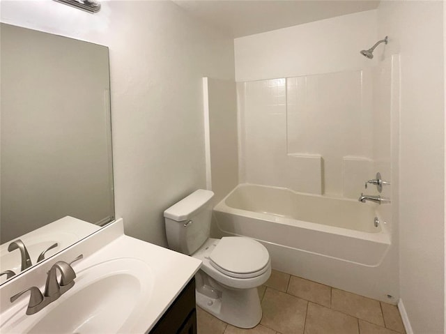 full bathroom with vanity, tub / shower combination, tile patterned floors, and toilet