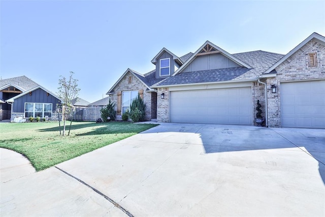 view of front facade featuring a garage and a front yard