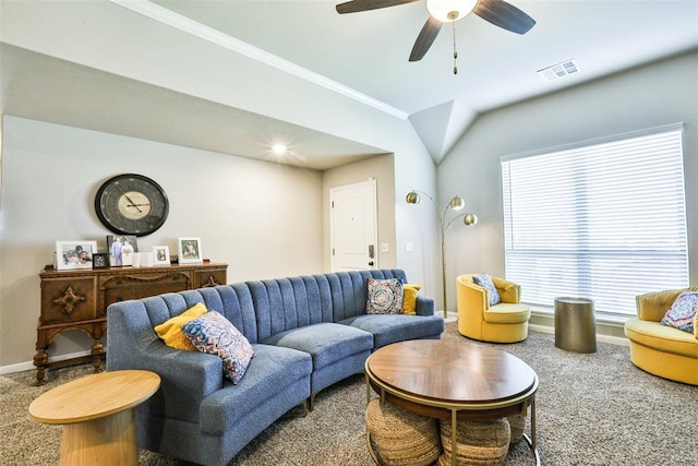 carpeted living room featuring crown molding and ceiling fan