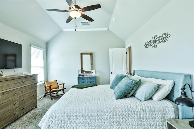 carpeted bedroom with ceiling fan and lofted ceiling