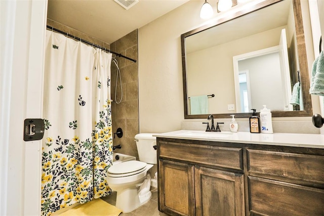 full bathroom with vanity, toilet, tile patterned flooring, and shower / bath combo