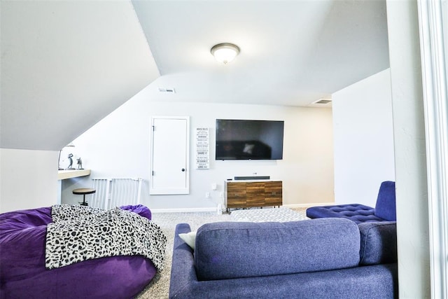 living room featuring vaulted ceiling and carpet flooring