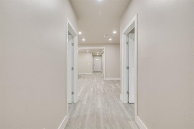 hall featuring light hardwood / wood-style flooring