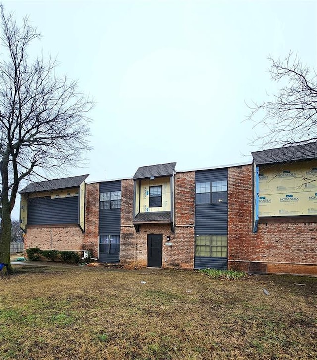 view of property exterior featuring a yard