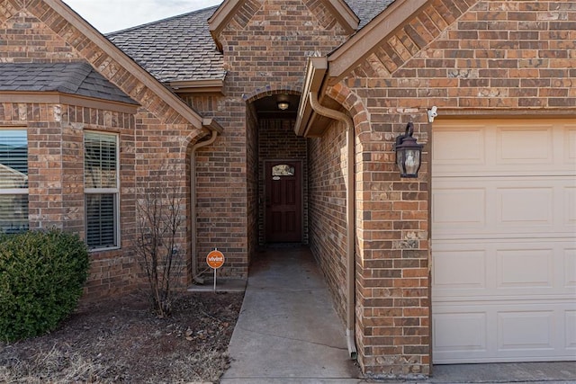 entrance to property featuring a garage