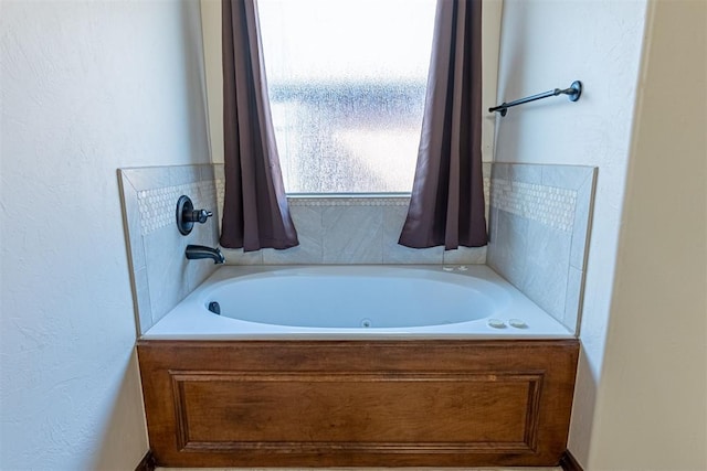 bathroom with a washtub