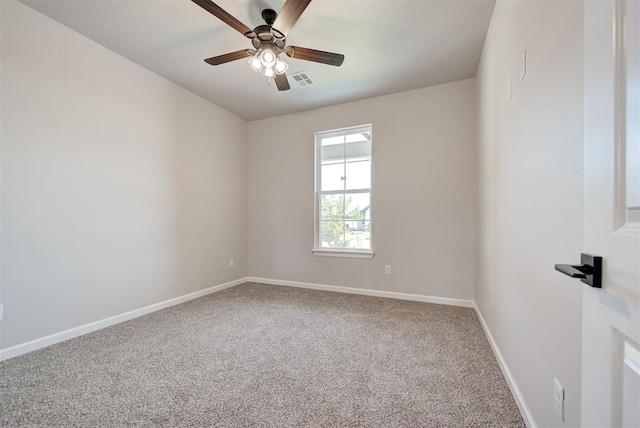 carpeted empty room with ceiling fan