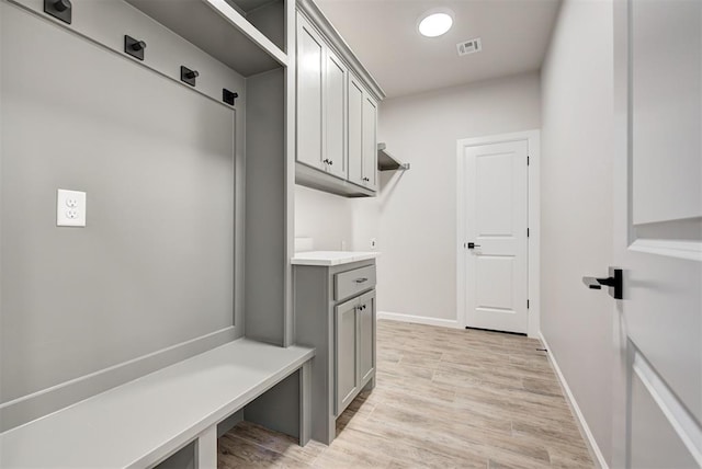 mudroom with light wood-type flooring