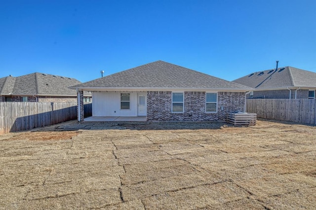 rear view of house with a patio area