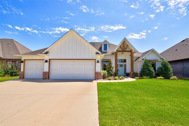 view of front of home with a garage and a front lawn