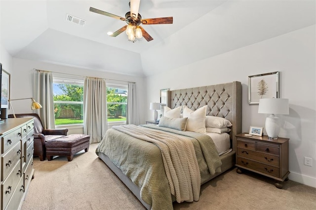 carpeted bedroom with vaulted ceiling and ceiling fan