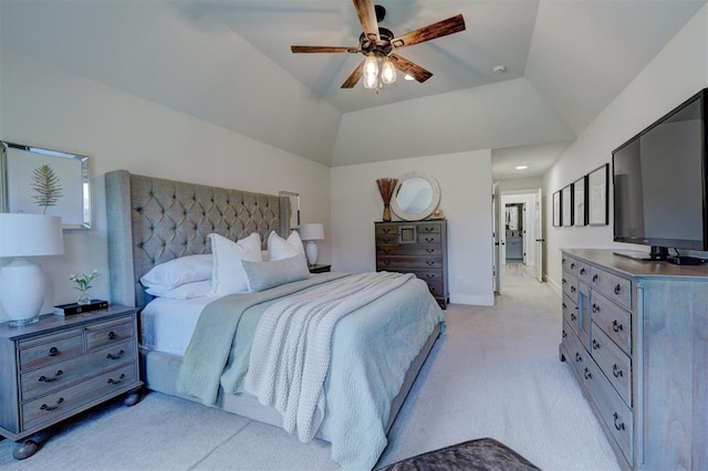 bedroom featuring ceiling fan, lofted ceiling, and light carpet