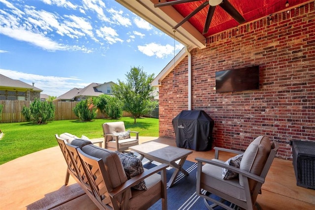 view of patio with a grill, outdoor lounge area, and ceiling fan