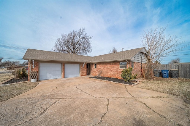 ranch-style house featuring a garage