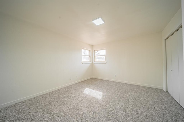 unfurnished bedroom with carpet floors