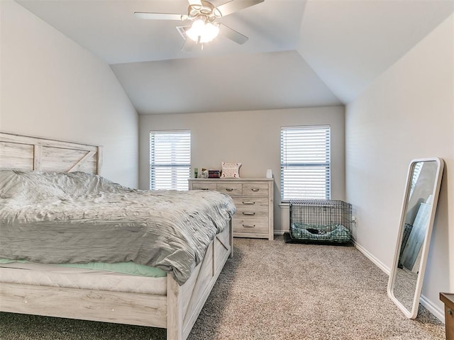 carpeted bedroom featuring lofted ceiling and ceiling fan