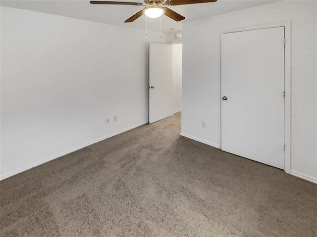 unfurnished bedroom with carpet floors and ceiling fan