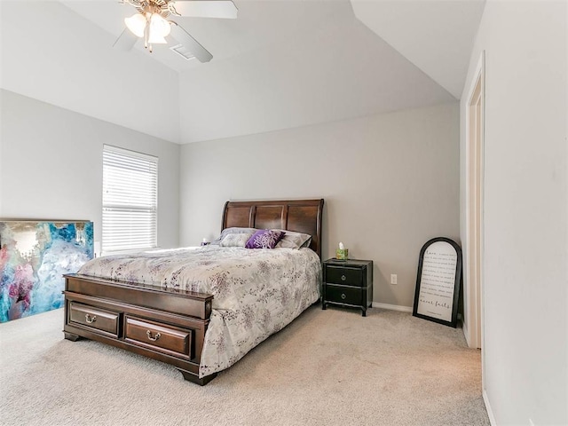 carpeted bedroom featuring vaulted ceiling and ceiling fan