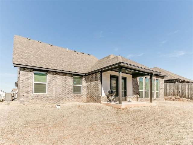 back of property featuring a patio